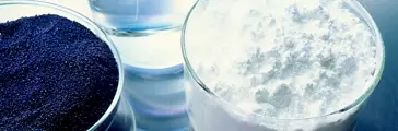 Various forms of silica and silicone ... silicon metal, powder, fluids, granules, pellets ... in glass beakers. Materials News / tradeshow display